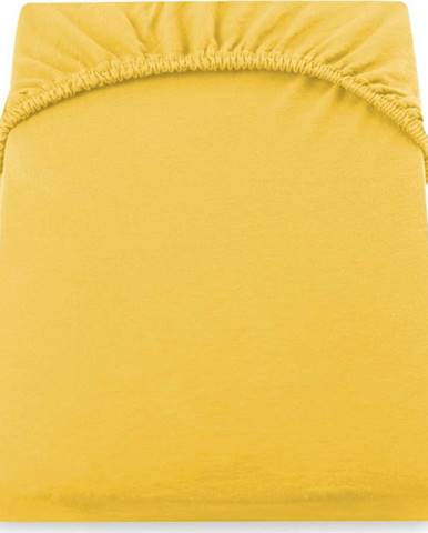 Žluté džersejové prostěradlo DecoKing Amber Collection, 160/180 x 200 cm