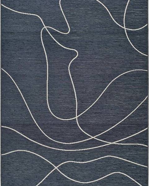 Tmavě modrý venkovní koberec s příměsí bavlny Universal Doodle, 57 x 110 cm