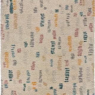 Světle béžový koberec Universal Ulai, 133 x 190 cm